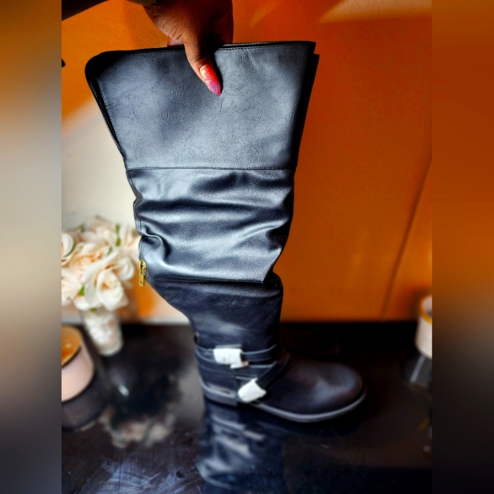 Brand new with box.Black wide calf (18.5") boots size 10
